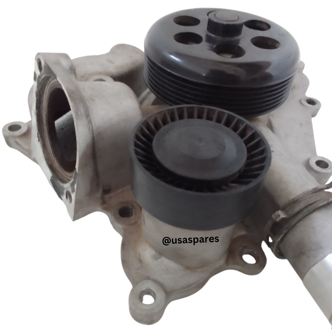 Used water pump for Jeep Grand Cherokee 5.7L engine – pre-owned OEM part in good condition for reliable cooling system performance.
