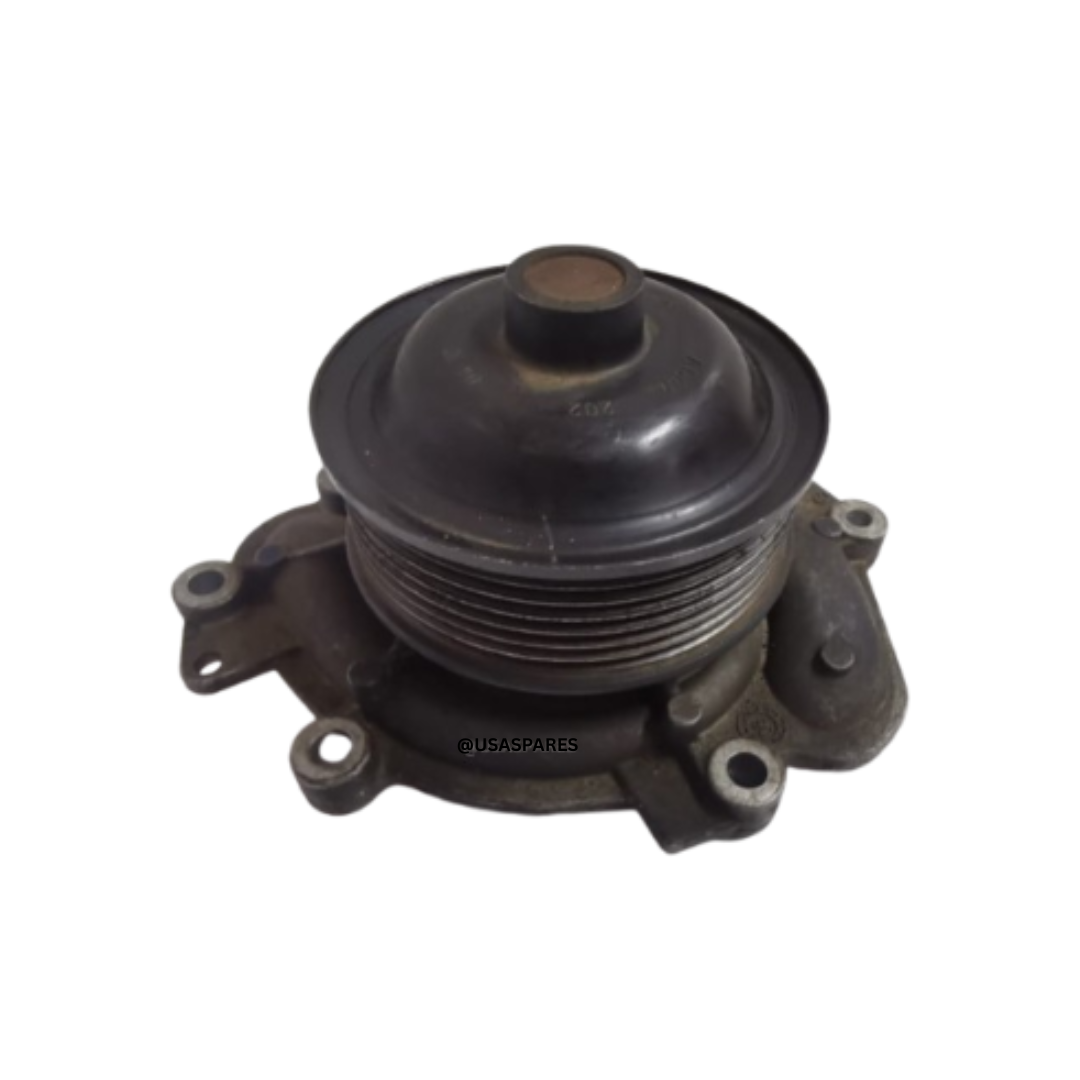 Used Jeep Grand Cherokee WK1 water pump compatible with 3.0L and 4.7L engines, inspected and ready for reliable cooling system performance.