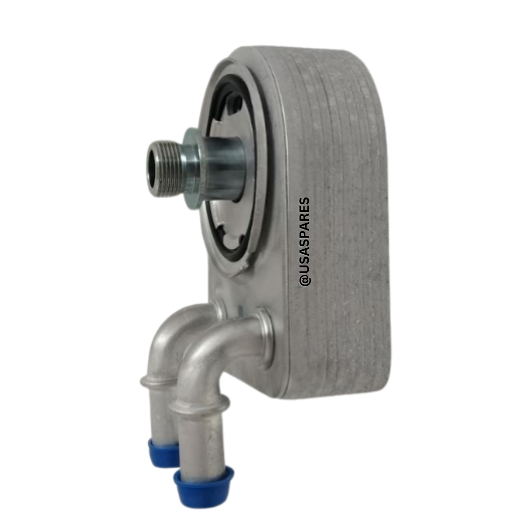 Image of a new Dodge Caliber Oil Cooler showing the aluminum cooling fins and inlet/outlet ports designed for efficient engine oil temperature control.