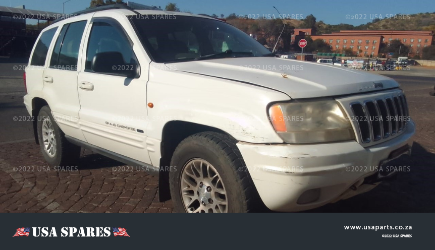 2002 Jeep Grand Cherokee 4.7 WJ being stripped for spares with available used parts including engine, gearbox, body panels, and interior components.