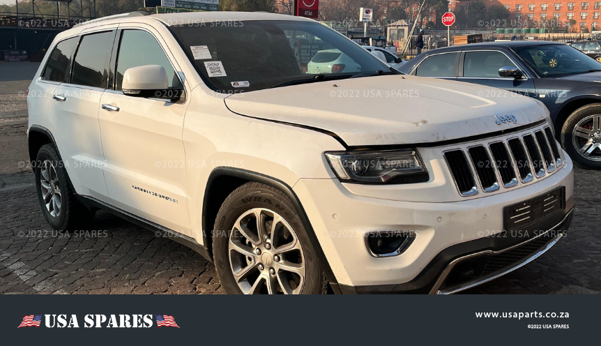 2014 Jeep Grand Cherokee 3.0 WK2 being stripped for spares with available used parts including diesel engine, transmission, suspension, body panels, interior, and electronic components.