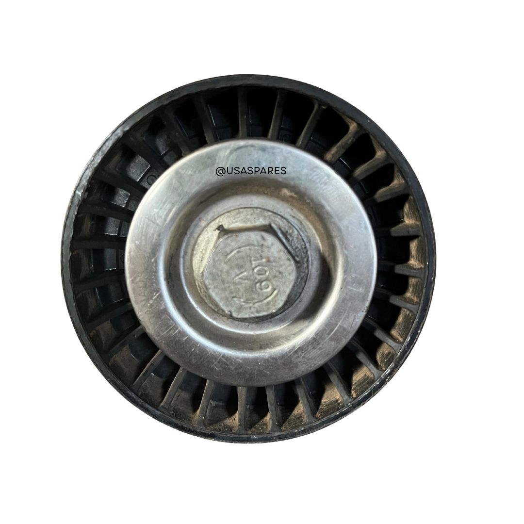 Jeep Patriot 2.4 used idler pulley in good condition, genuine OEM part inspected for reliable performance and fit.
