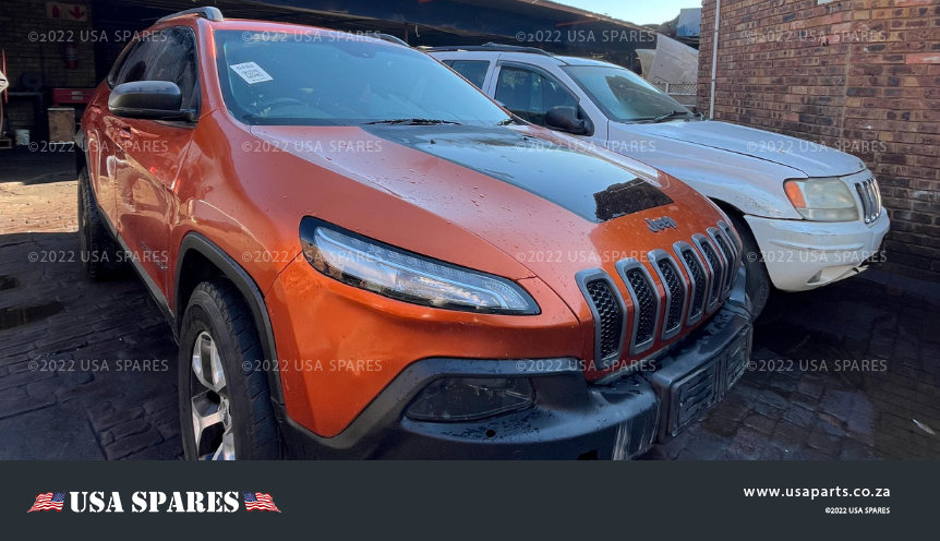 Alt text: "2014 Jeep Cherokee 3.2 KL being stripped for spares with available used engine, body, and interior parts"