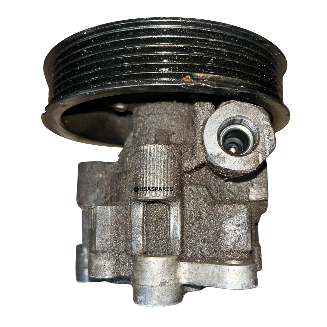 Used Dodge Nitro 2.8 power steering pump, OEM fit, fully tested, reliable replacement for smooth and responsive steering.