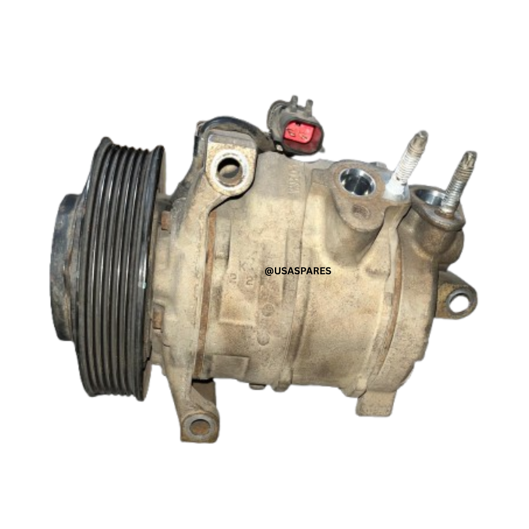 Used Jeep Grand Cherokee 3.0 WK2 aircon pump, OEM fit for diesel models, tested for performance and ready to restore cooling efficiency