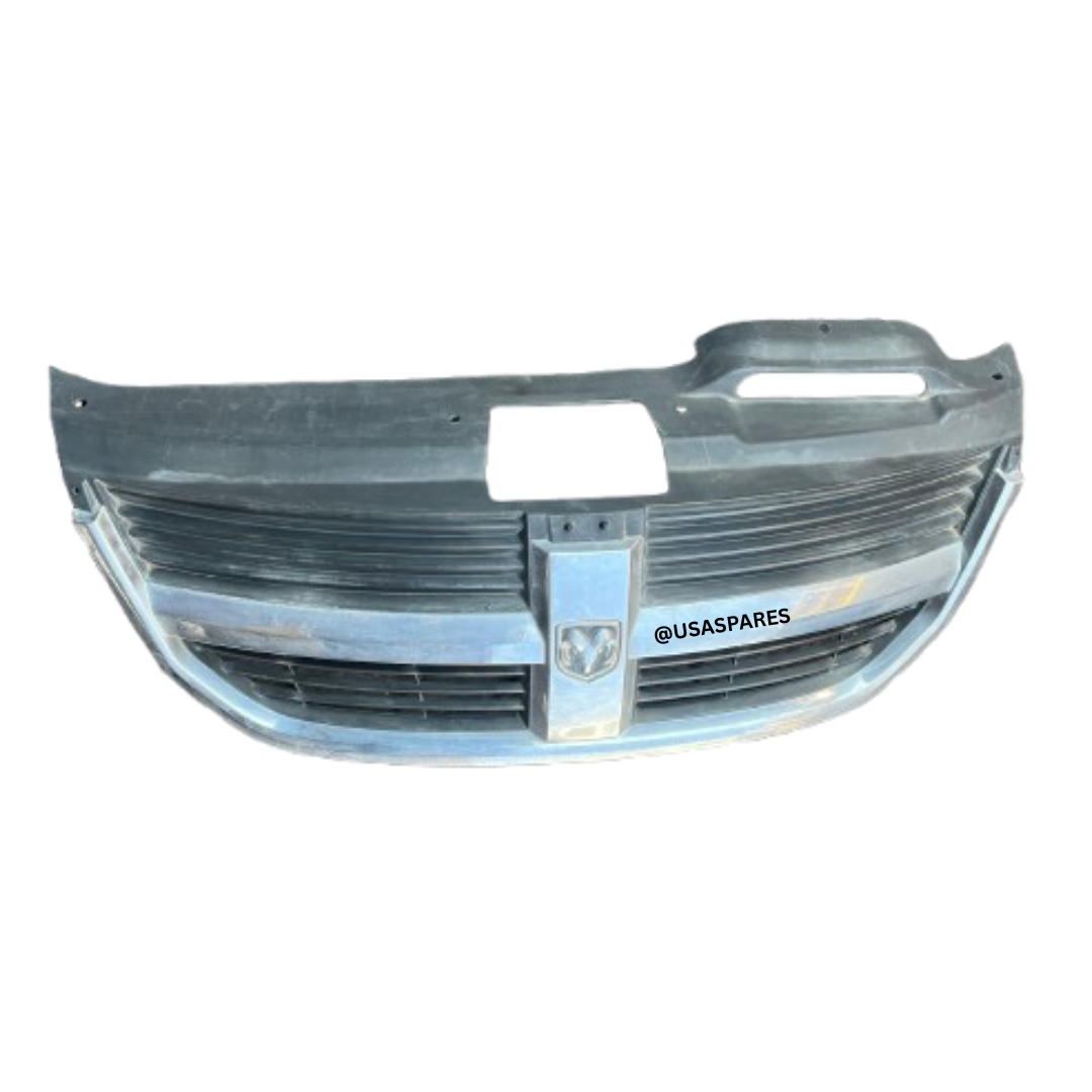 Used Dodge Caliber grille in excellent condition, OEM fit, durable construction, and ready to restore front-end style and protection