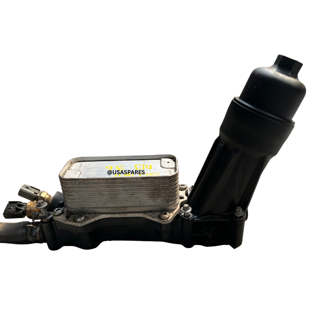 Used Dodge Journey 3.6 oil cooler, OEM tested replacement for restoring engine oil temperature control and preventing overheating.