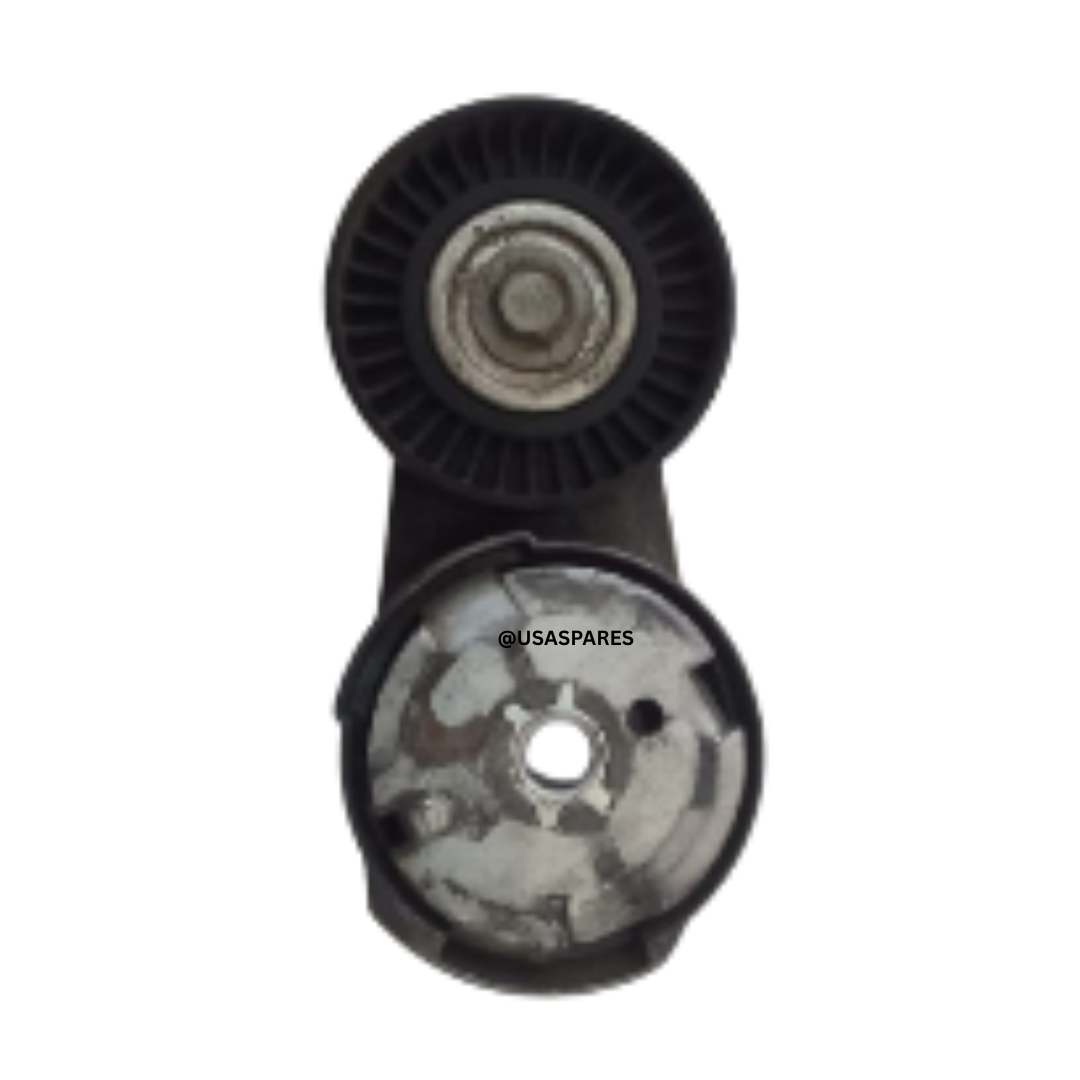 Used Jeep Grand Cherokee 3.6 WK2 Tensioner showing pulley and spring mechanism for maintaining belt tension in the engine accessory system.