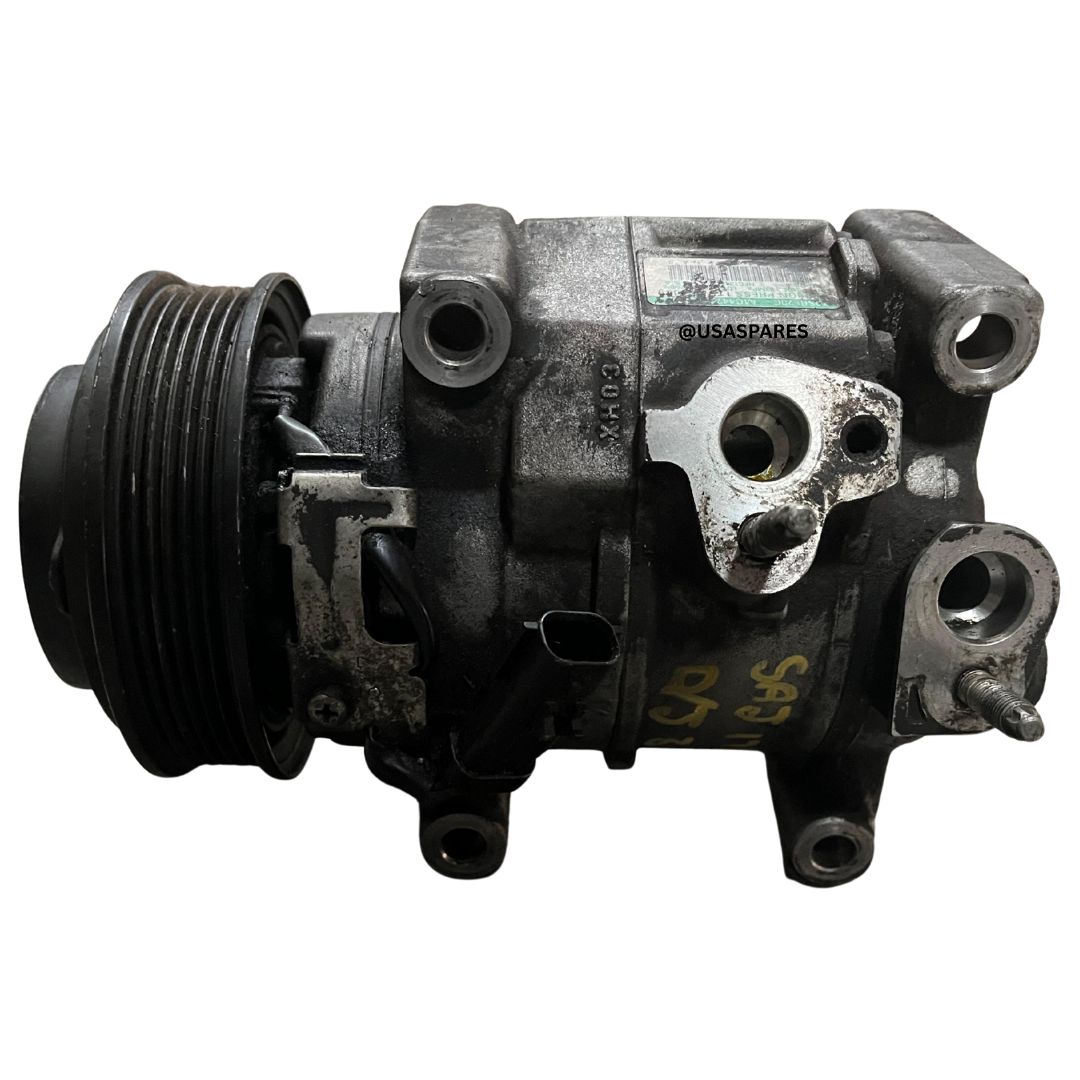 Used Dodge Journey 3.6 aircon pump, OEM AC compressor, fully tested replacement for restoring cooling and air conditioning performance.