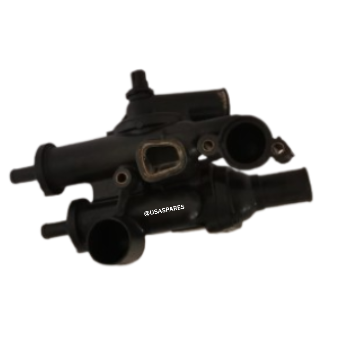 Used Jeep Compass thermostat housing, OEM fit, inspected and tested for leaks, cracks, and reliable cooling system performance