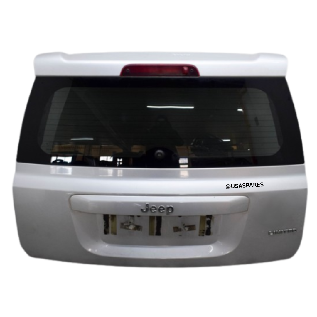 Jeep Patriot tailgate shell, OEM fit, supports rear window, latch, and lights, restoring rear functionality and appearance