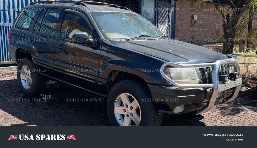 2000 Jeep Grand Cherokee 4.0 WJ stripping for spares – used Jeep parts available including engine, body, and suspension components.