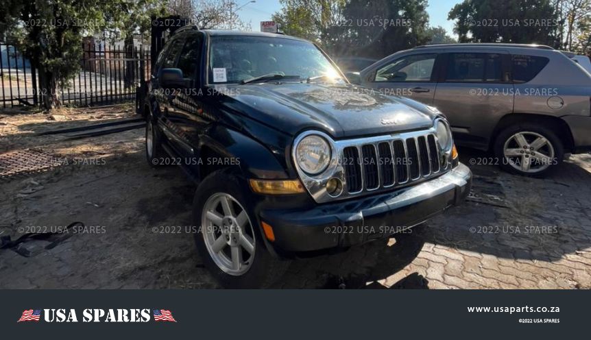 Image of 2005 Jeep Cherokee 3.7 KJ Automatic Petrol stripping for spares, showing dismantled vehicle components including engine parts, suspension, body panels, and interior items available for resale.